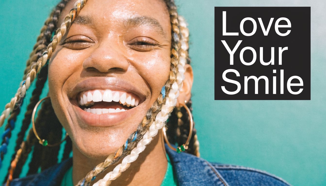 A close up of a smiling woman with braided hair against a bright teal background with text