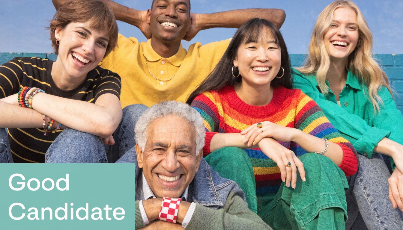 A diverse group of smiling people sitting together outdoors, highlighting dental health and cosmetic dentistry.
