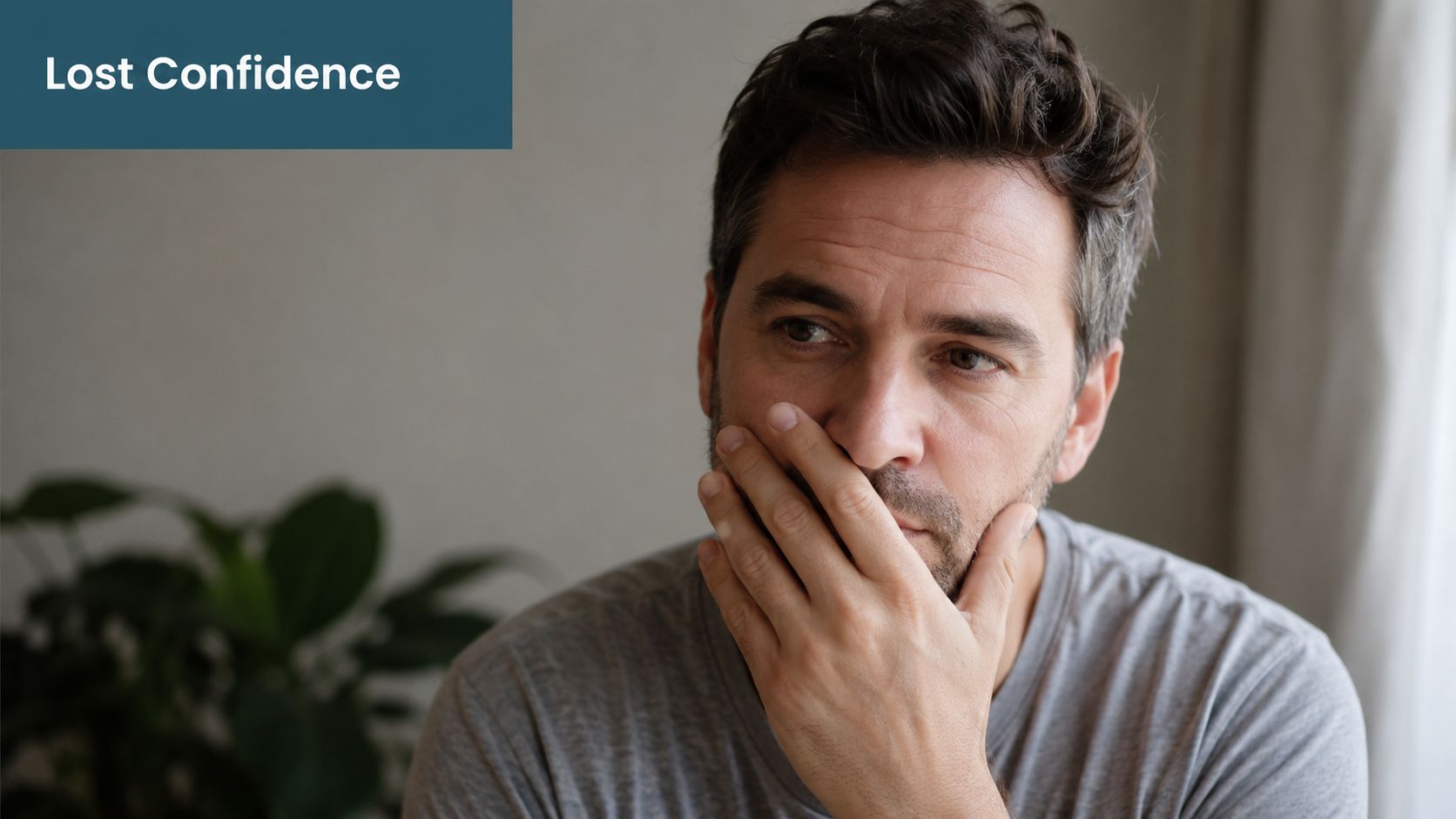 A concerned middle-aged man covering his mouth with his hand, showing signs of distress or dental anxiety.