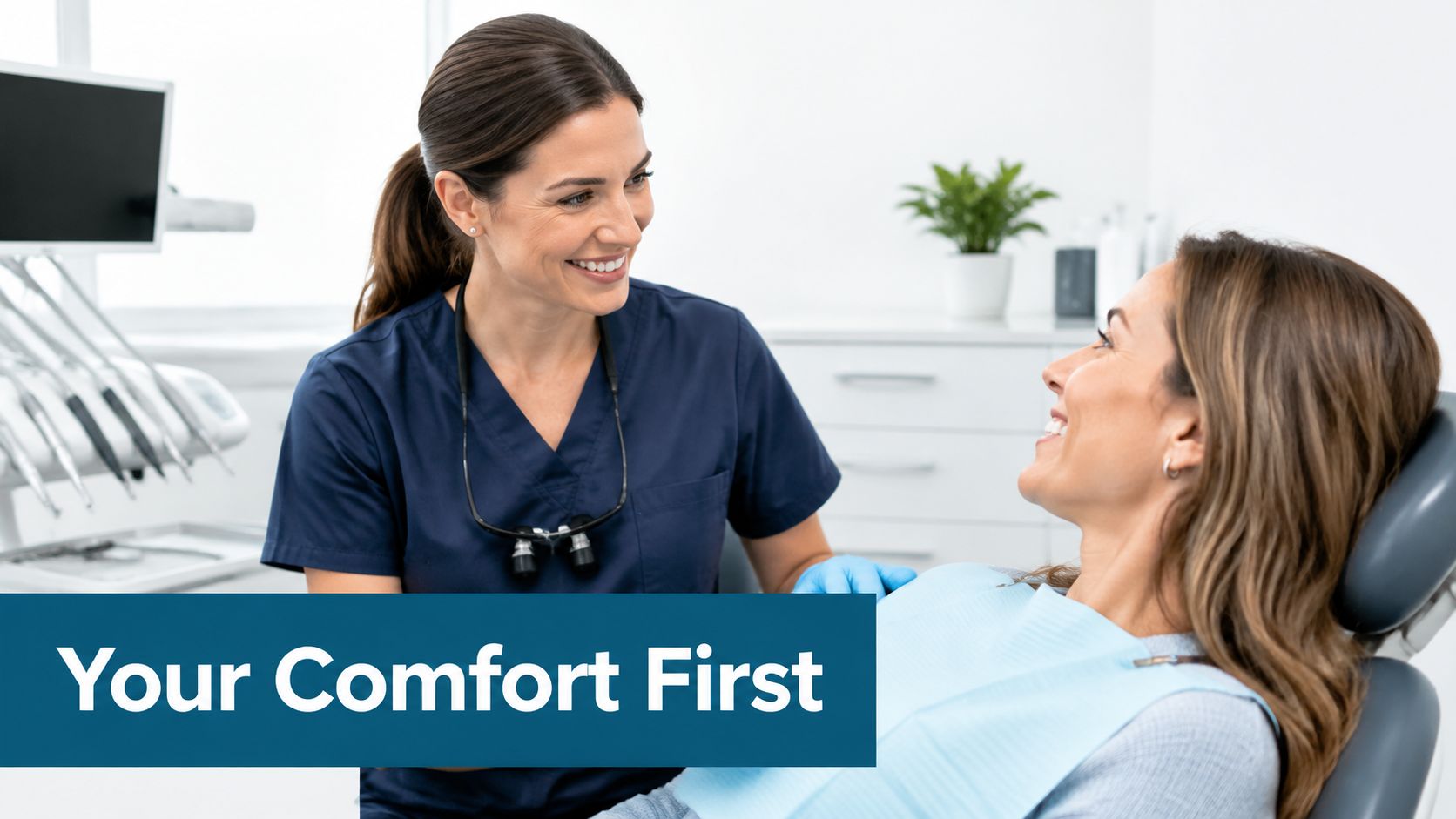 A friendly female dentist smiling and consulting with a patient in a modern dental office setting.